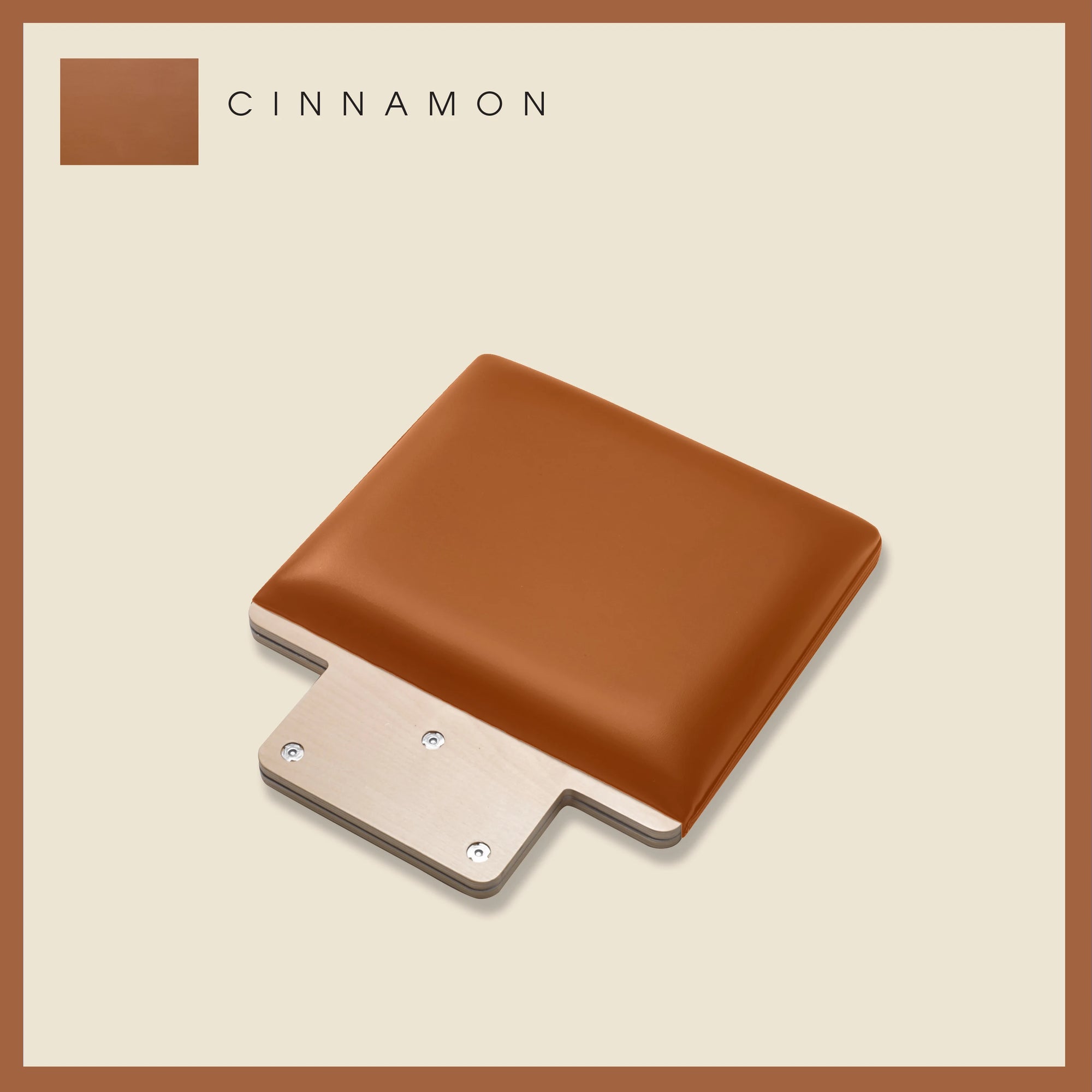 Cinnamon-colored padded Jump Board Accessory with a sleek, minimalist design on a light beige background.