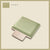 Sage-colored padded jump board with a sleek, minimalistic design on a light beige background.