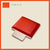 Tomato-colored padded jump board with a sleek, minimalistic design on a light beige background.