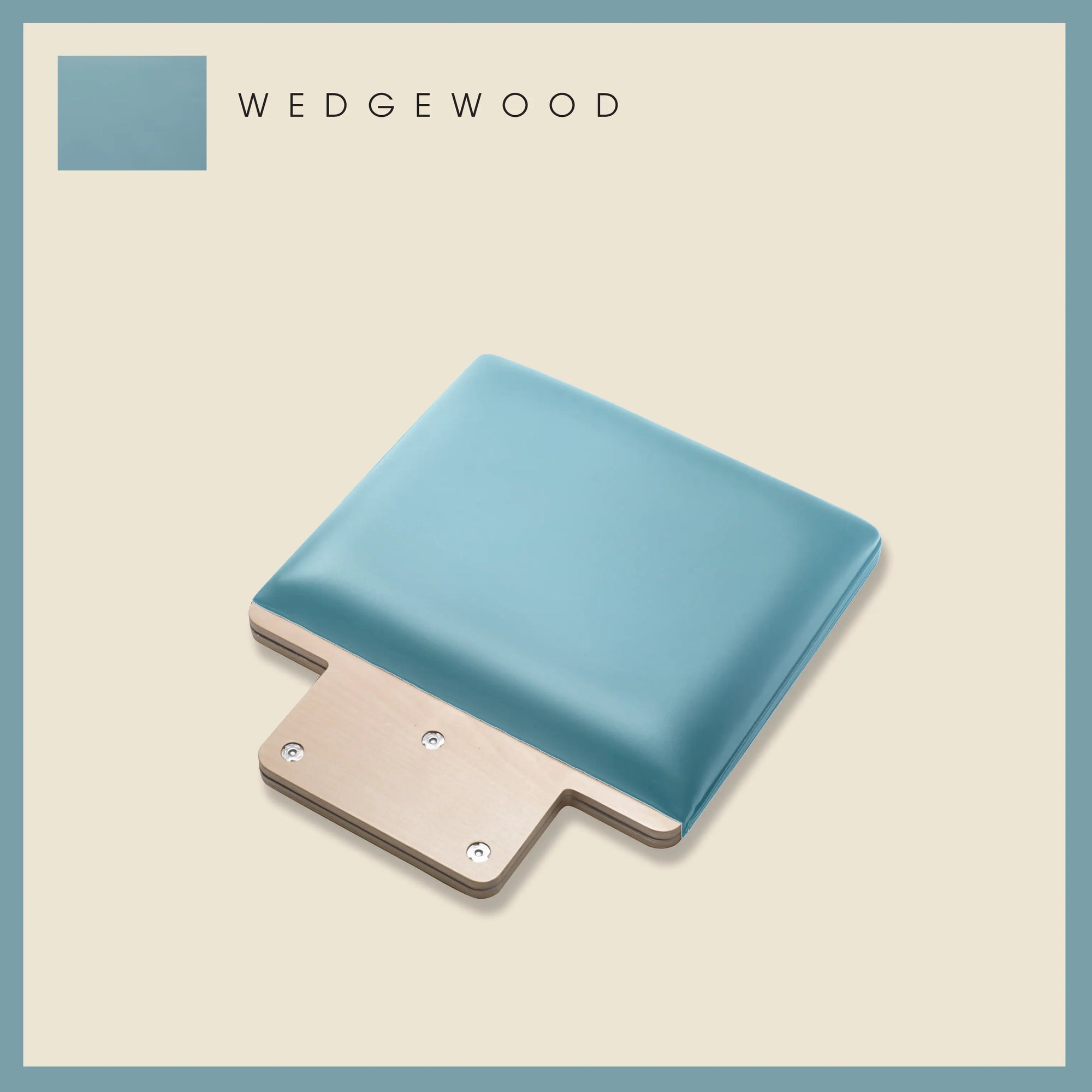 Wedgewood-colored padded jump board with a sleek, minimalistic design on a light beige background.